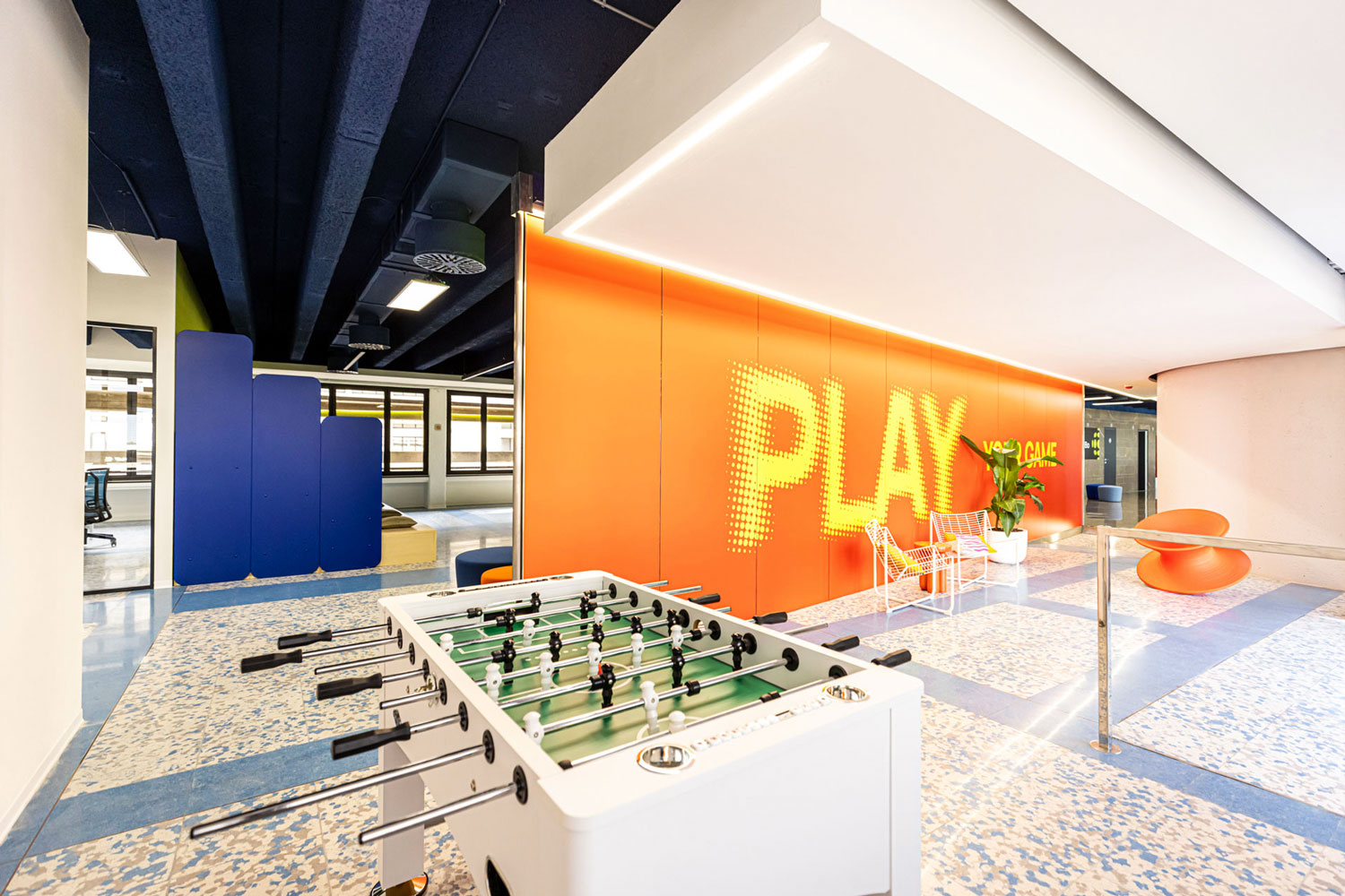 Land in Bo interiors, relax and play area with foosball