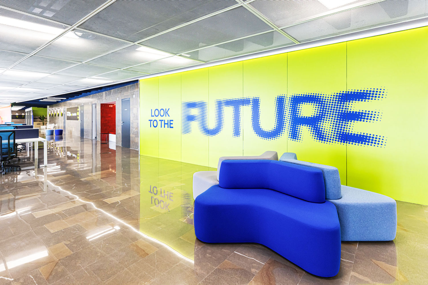 Land in Bo interiors, relax area with sofas and 'Future' wall pre-spaced vinyl sticker